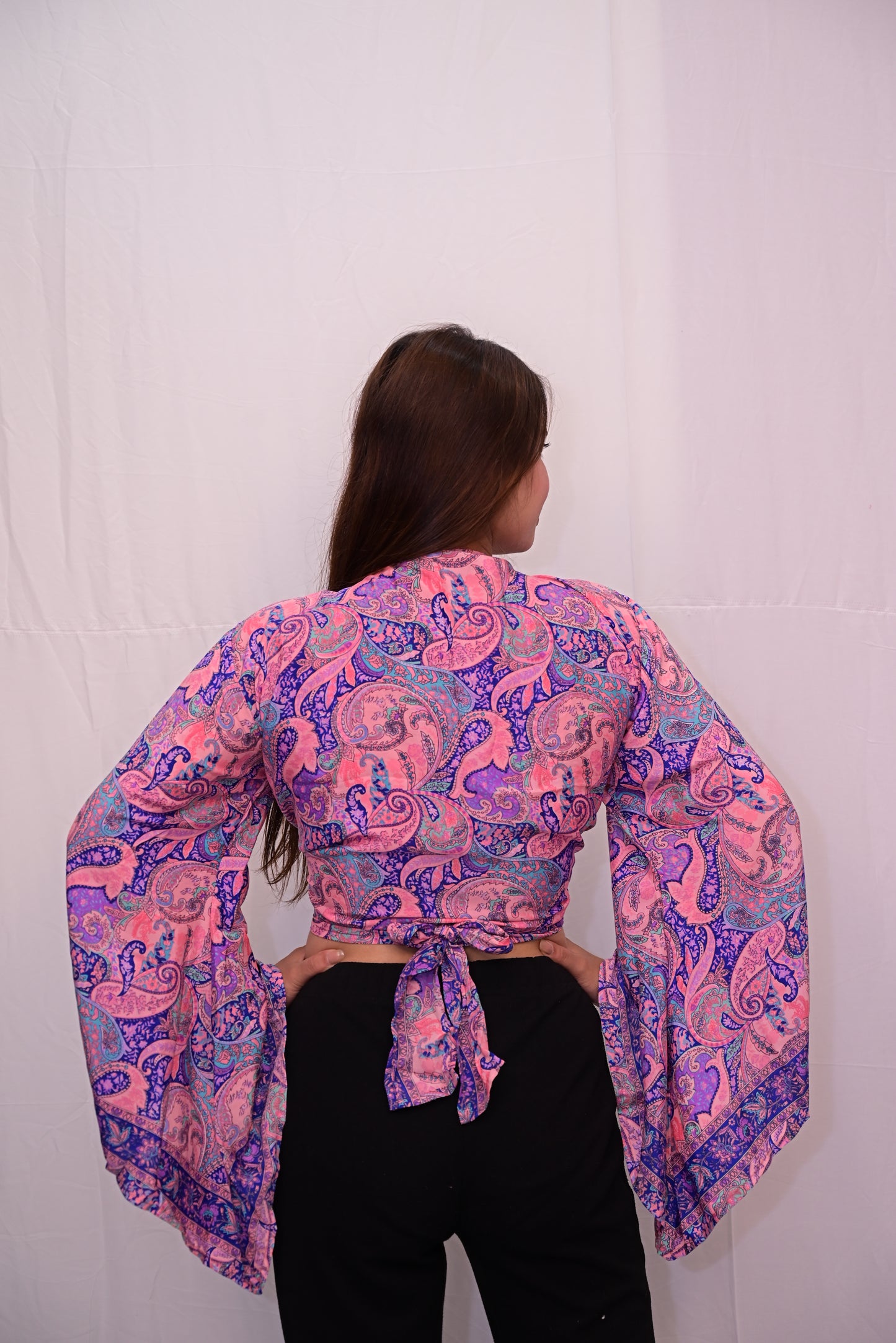 Tie top bell sleeve